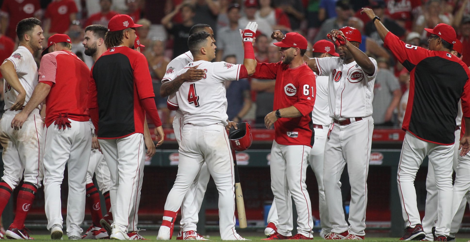 Photos: Reds beat Brewers on wild play in 11th