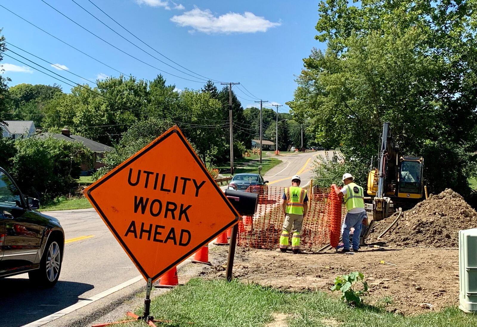 Construction workers on Shakertown Road in Beavercreek. The city's road widening project may begin as early as this fall. LONDON BISHOP/STAFF