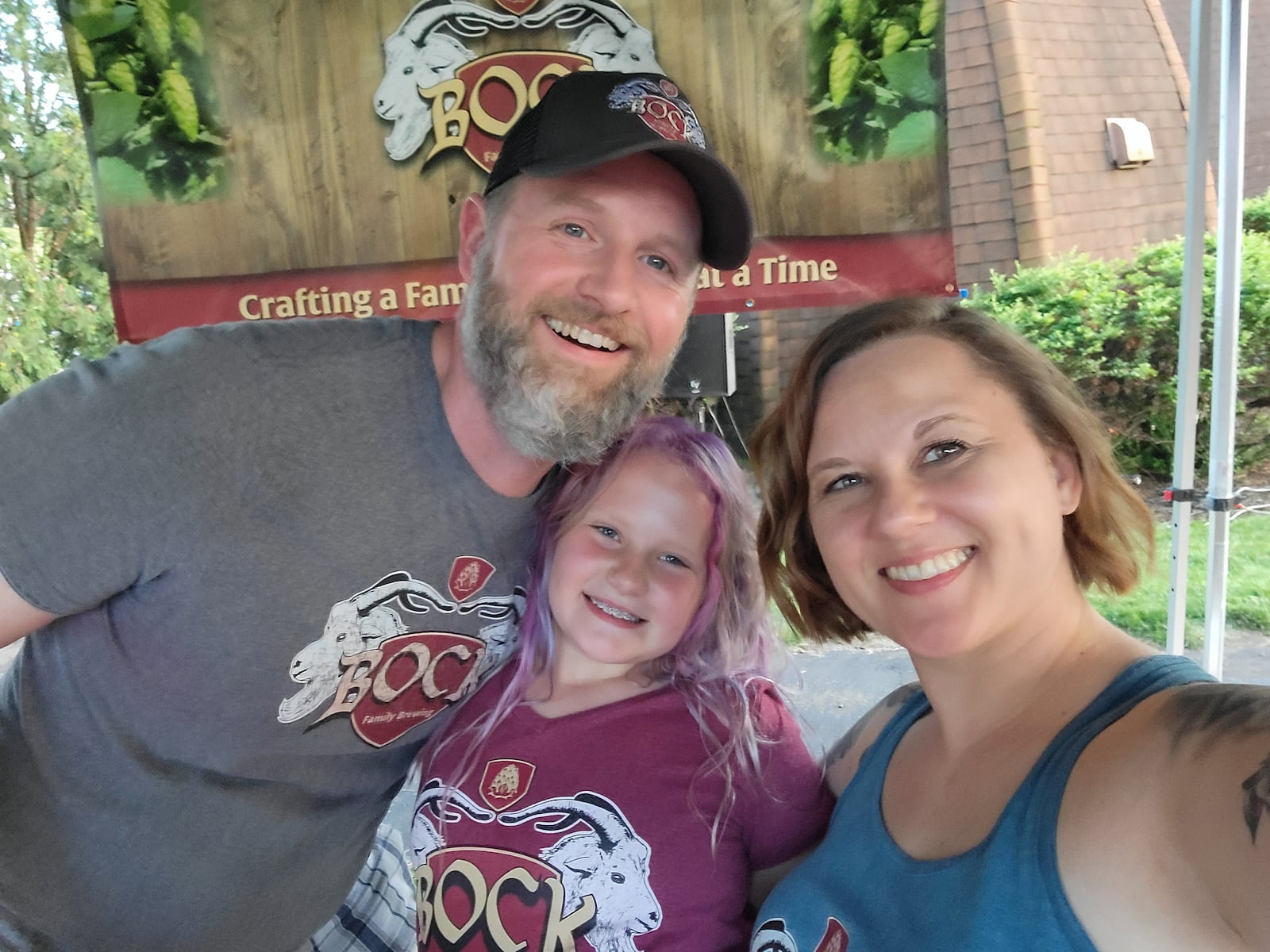 Ian (Left), Aria (center) and Jen (Right) outside of Bock Family brewing. The couple is hoping to add a larger outdoor space soon.