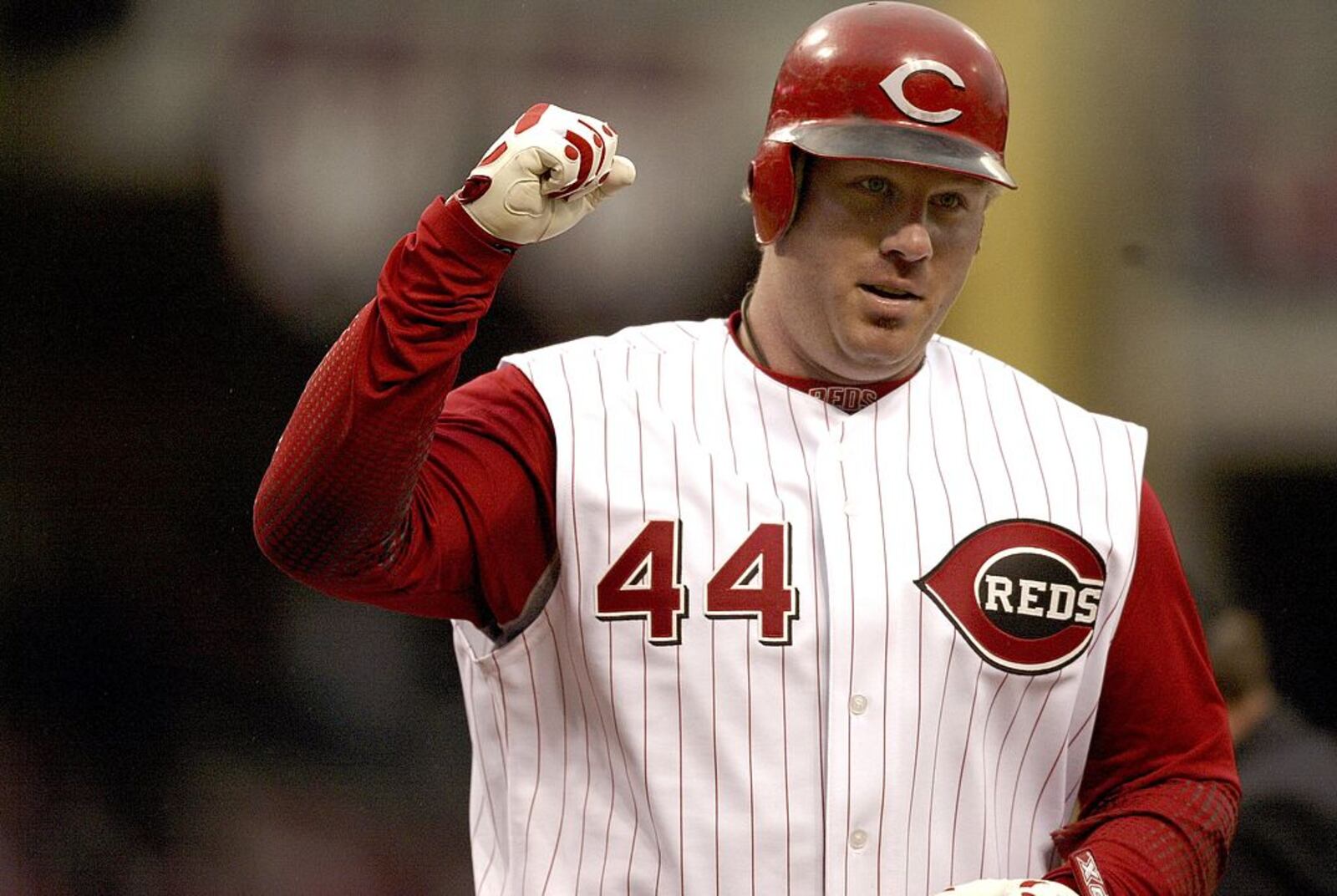 CINCINNATI - APRIL 3: Outfielder Adam Dunn #44 of the Cincinnati Reds celebrates being batted in against the Chicago Cubs on Opening Day at Great American Ball Park on April 3, 2006 in Cincinnati, OH. (Photo by Thomas E. Witte/Getty Images)