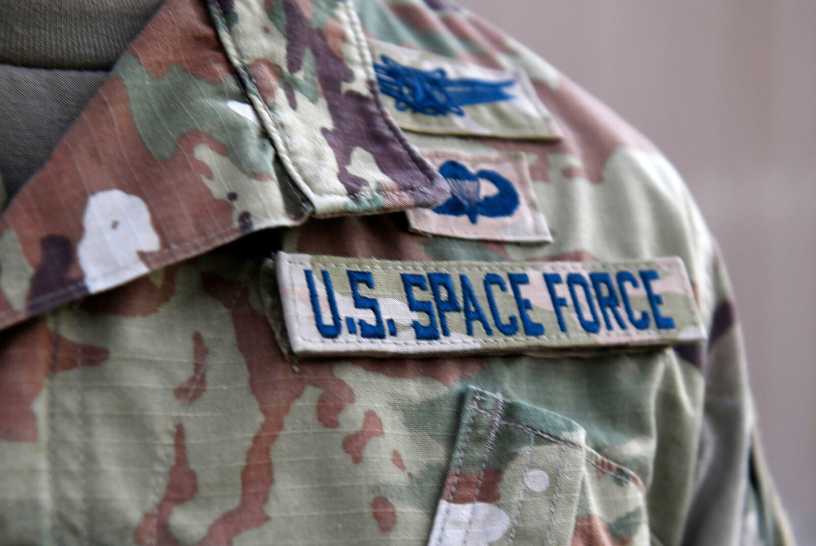 FILE - In this photo released by the U.S. Air Force, Capt. Ryan Vickers stands for a photo to display his new service tapes after taking his oath of office to transfer from the U.S. Air Force to the U.S. Space Force at Al-Udeid Air Base, Qatar, Tuesday, Sept. 1, 2020. The U.S. Air Force abruptly changed its procedures to select a permanent headquarters for the U.S. Space Command during the election year of 2020, which led to it choosing heavily Republican Alabama over Democrat-dominated Colorado after a White House meeting, according to a report from the General Accounting Office that was made public Thursday, June 2, 2022. (Staff Sgt. Kayla White/U.S. Air Force via AP,File)