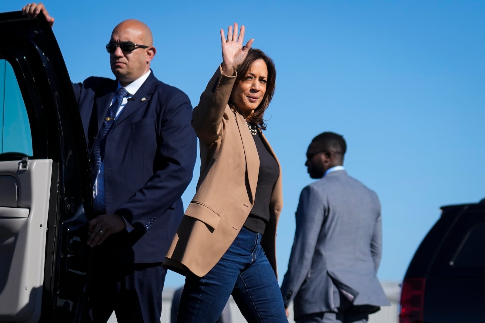 Democratic presidential nominee Vice President Kamala Harris Vice waves as she walks to board Air Force Two at Philadelphia International Airport in Philadelphia, Thursday, Oct. 24, 2024, en route to Atlanta. (AP Photo/Matt Rourke)