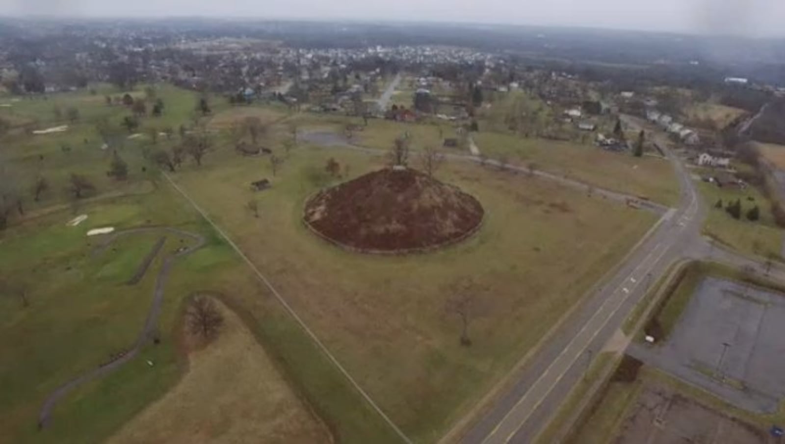 The Miamisburg Mound, which is listed on the National Register of Historic Places, is among North America's largest conical mounds. It's believed that mounds like these were built between 2,000 and 2,800 years ago. TY GREENLEES / STAFF