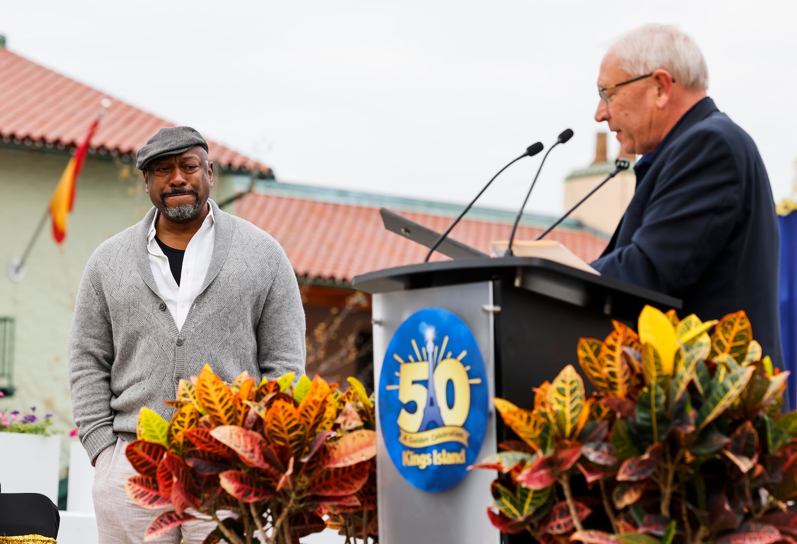 Kings Island held an opening ceremony and ribbon cutting Friday, April 29, 2022 in celebration of their 50th Anniversary.  Former Kings Island employee and actor Alton Fitzgerald White, left, was brought to tears as he was surprised to be inducted into the Kings Island Hall of Fame during the ceremony by Kings Island President and General Manager Mike Koontz. NICK GRAHAM/STAFF