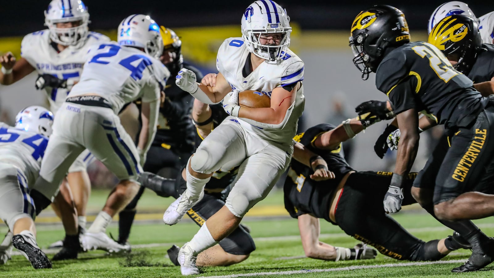 Springboro High School junior Mattias Brunicardi runs the ball during their Division I, Region 2 playoff game at Centerville on Friday night at Centerville Stadium. The Elks won 14-7. Michael Cooper/CONTRIBUTED