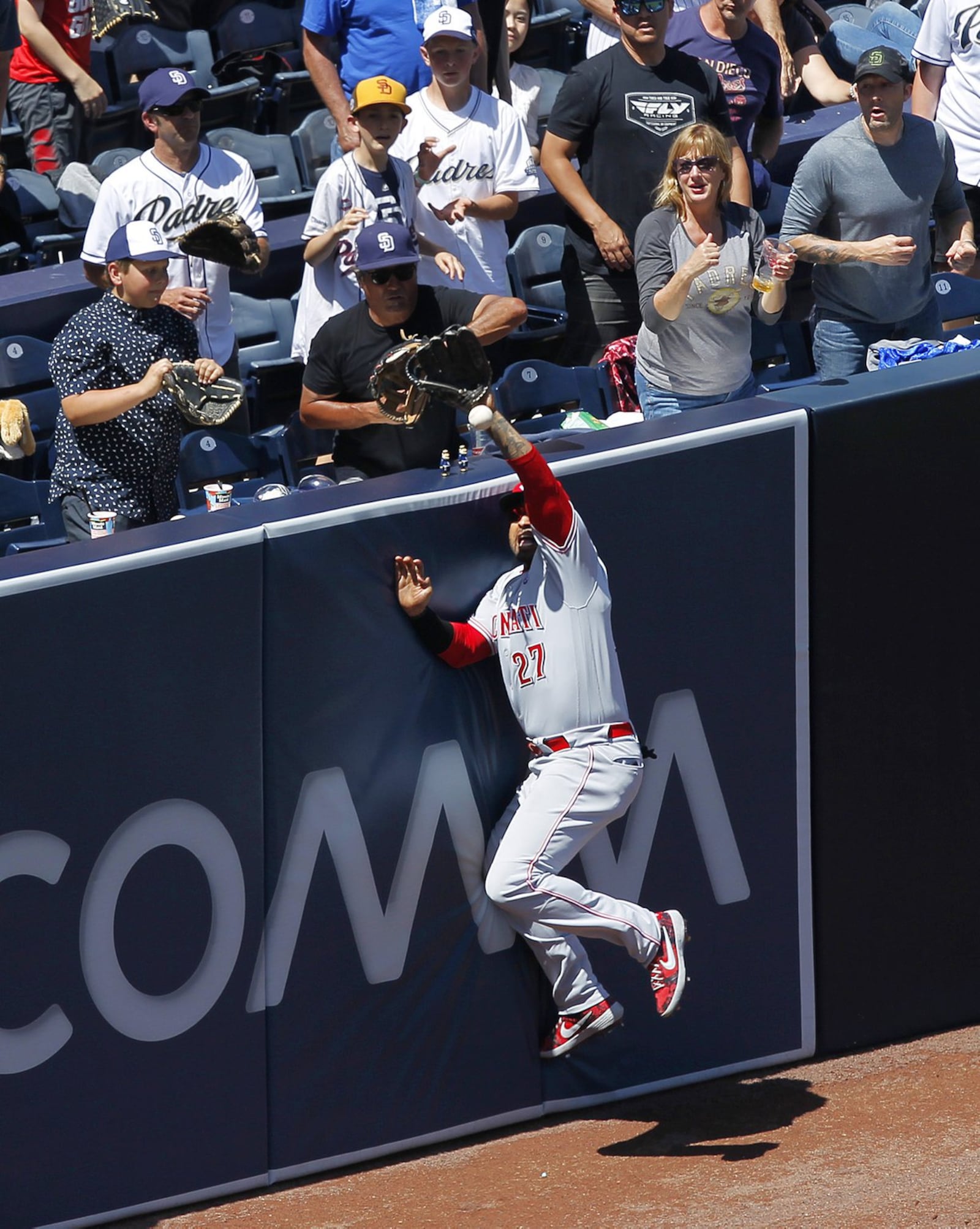 Reds left fielder Matt Kemp can’t make a catch on a two-run double by San Diego Padres’ Wil Myers in the third inning on Sunday, April 21, 2019 at Petco Park in San Diego, Calif. (K.C. Alfred/San Diego Union-Tribune/TNS)