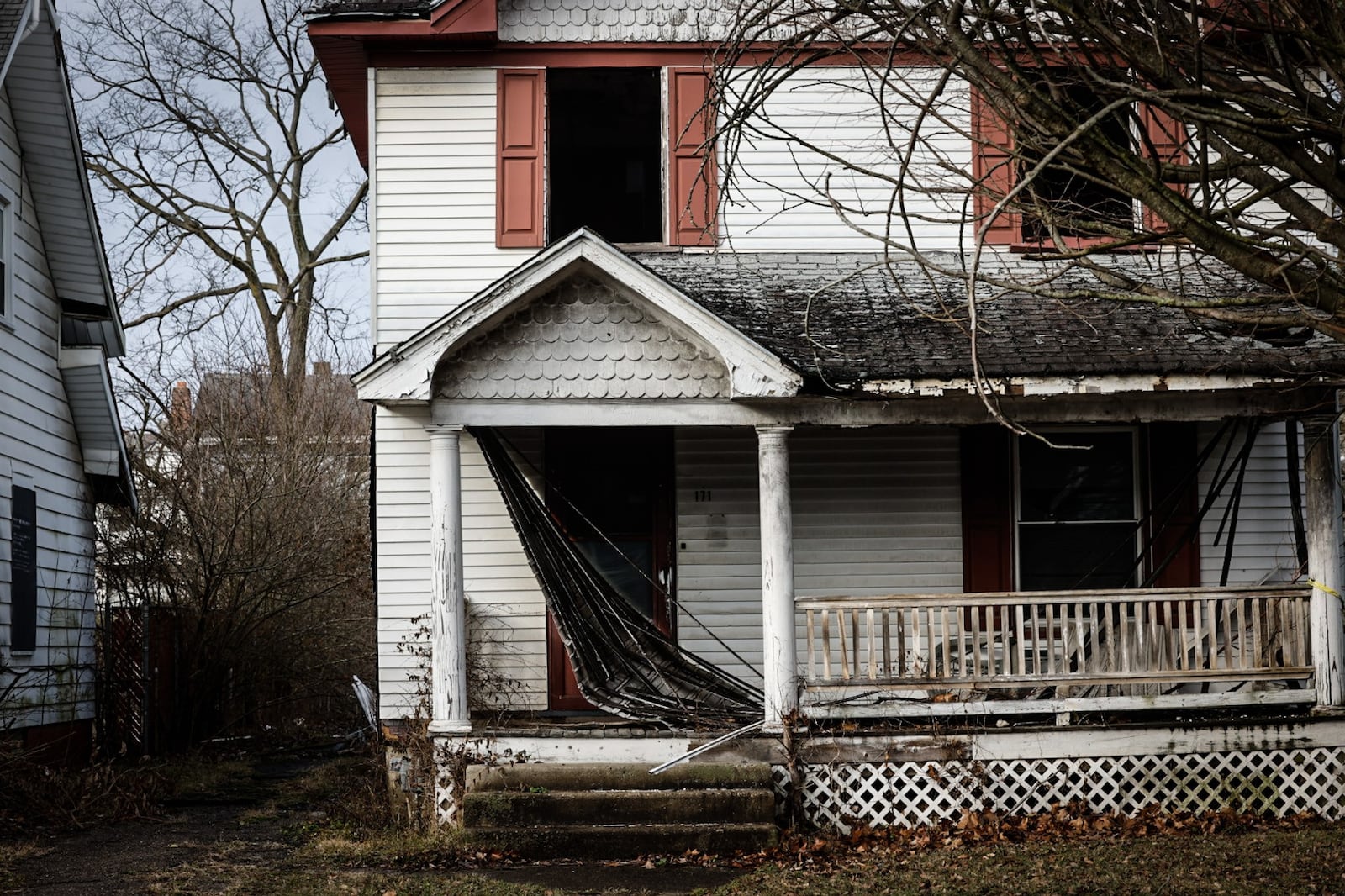 The city of Dayton plans to spend $22 million to remove more than 1,000 nuisance properties in the next several years. This vacant home is on Lorenz Ave. in Dayton. JIM NOELKER/STAFF