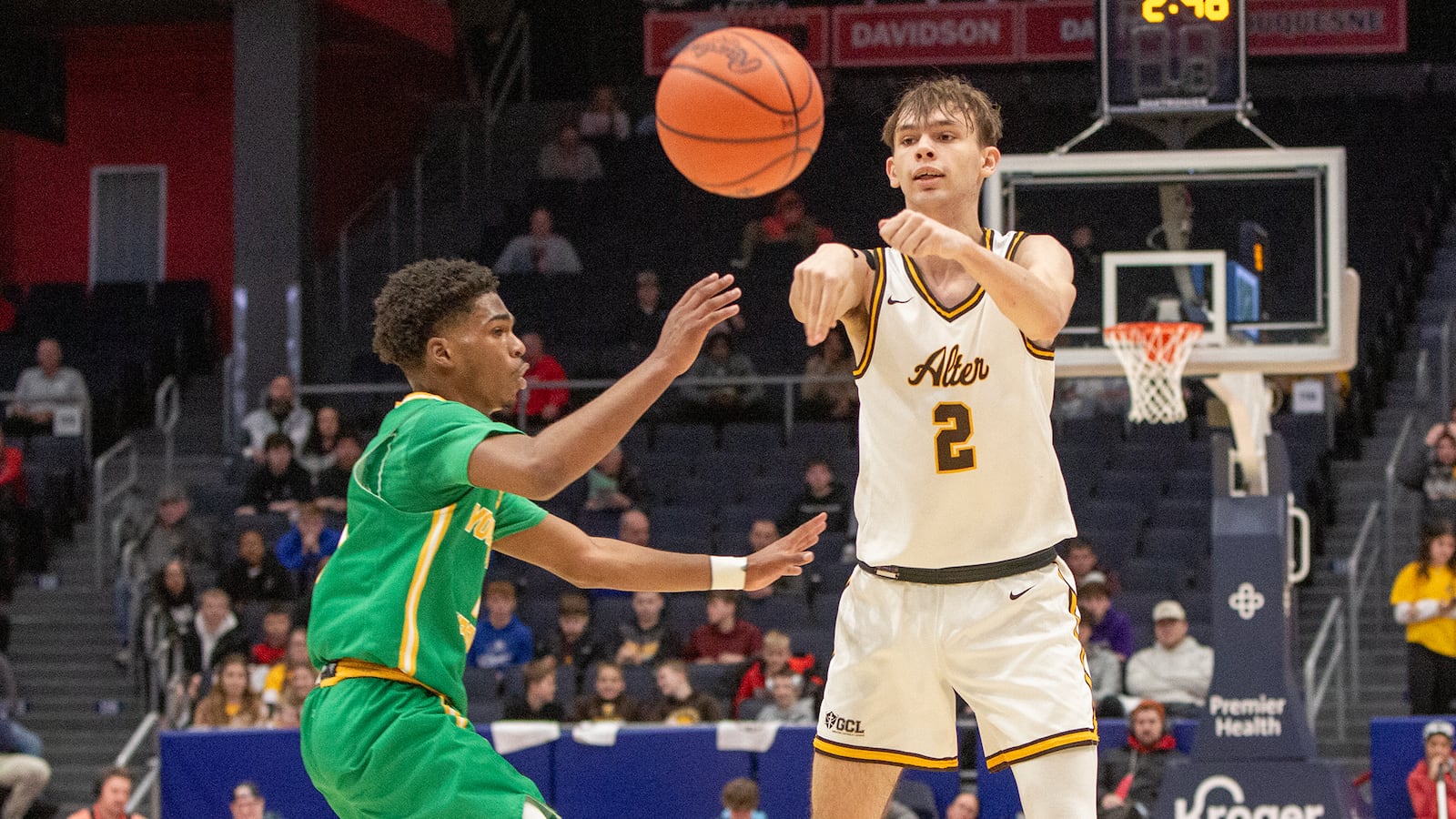 Alter's Brady Conner passes to a teammate against Youngstown Ursuline during the Knights' state semifinal win at UD Arena. Jeff Gilbert/CONTRIBUTED