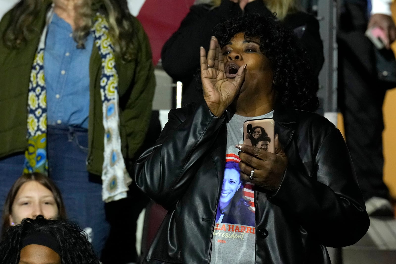 A supporter cheers as Democratic presidential nominee Vice President Kamala Harris arrives to speak during a campaign rally at Erie Insurance Arena, in Erie, Pa., Monday, Oct. 14, 2024. (AP Photo/Jacquelyn Martin)