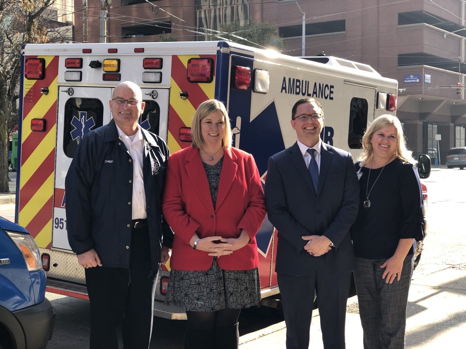 Dayton fire Chief Jeff Payne, Mayor Nan Whaley, American Medical Response regional director John Robben and Beth Calcidise, director of CareFlight and transportation with Miami Valley Hospital. CORNELIUS FROLIK / STAFF