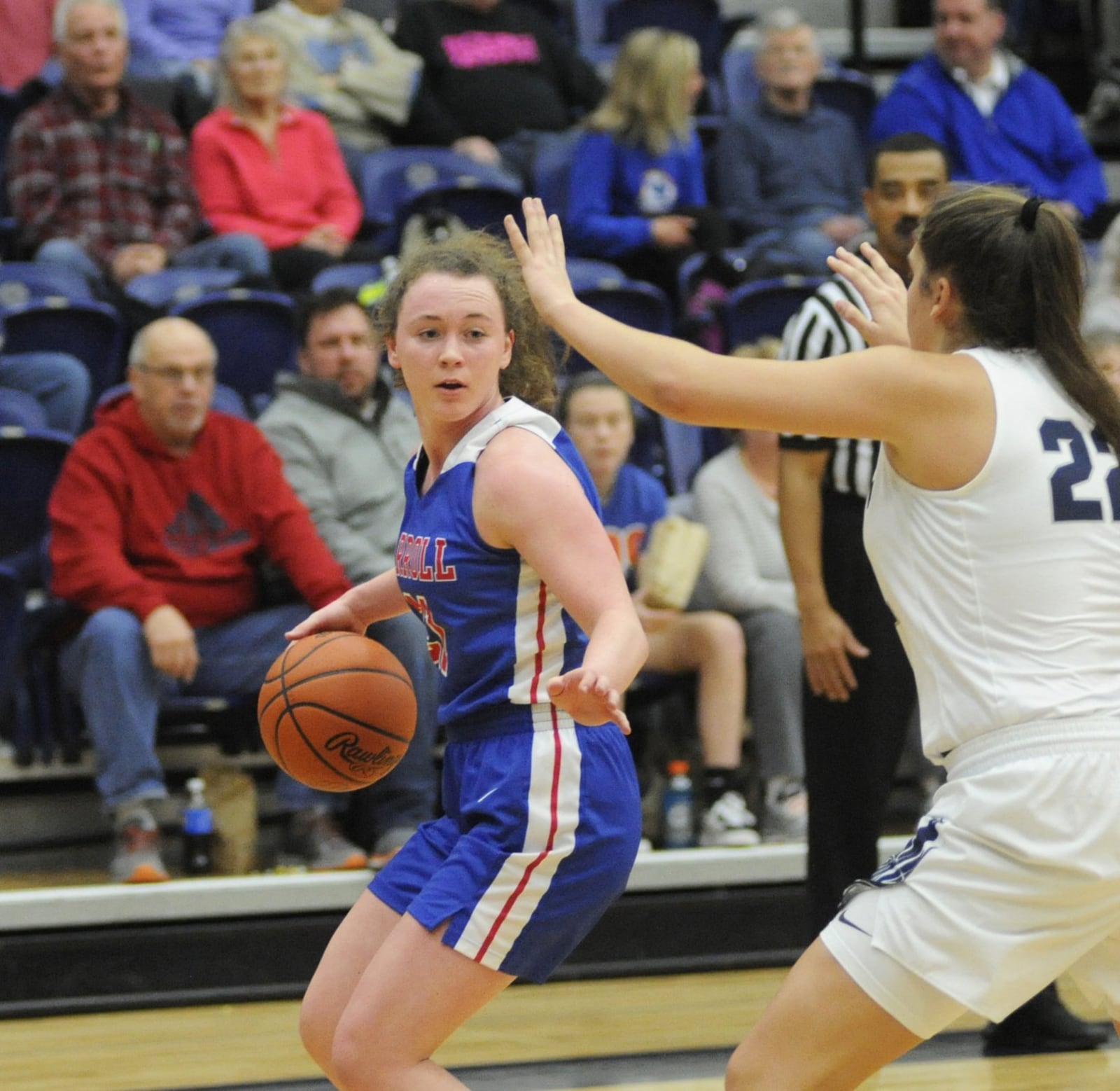 Elisabeth Bush of Carroll (with ball) is checked by Fairmont defender Madison Bartley. Carroll defeated host Fairmont 64-60 in double OT in a girls high school basketball game at Trent Arena on Monday, Jan. 28, 2019. MARC PENDLETON / STAFF