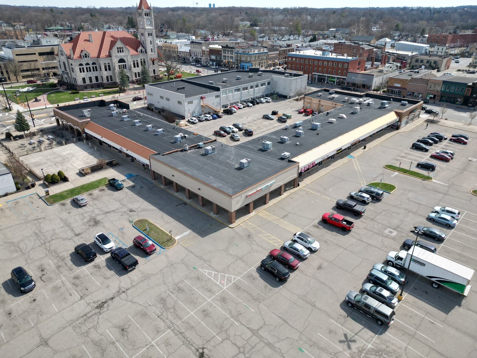 Developer Dillin LLC bought the L-shaped building in the foreground in Xenia that houses the Acapulco restaurant and other businesses. Renovations are set to begin before then end of 2023. CONTRIBUTED PHOTO / DILLIN