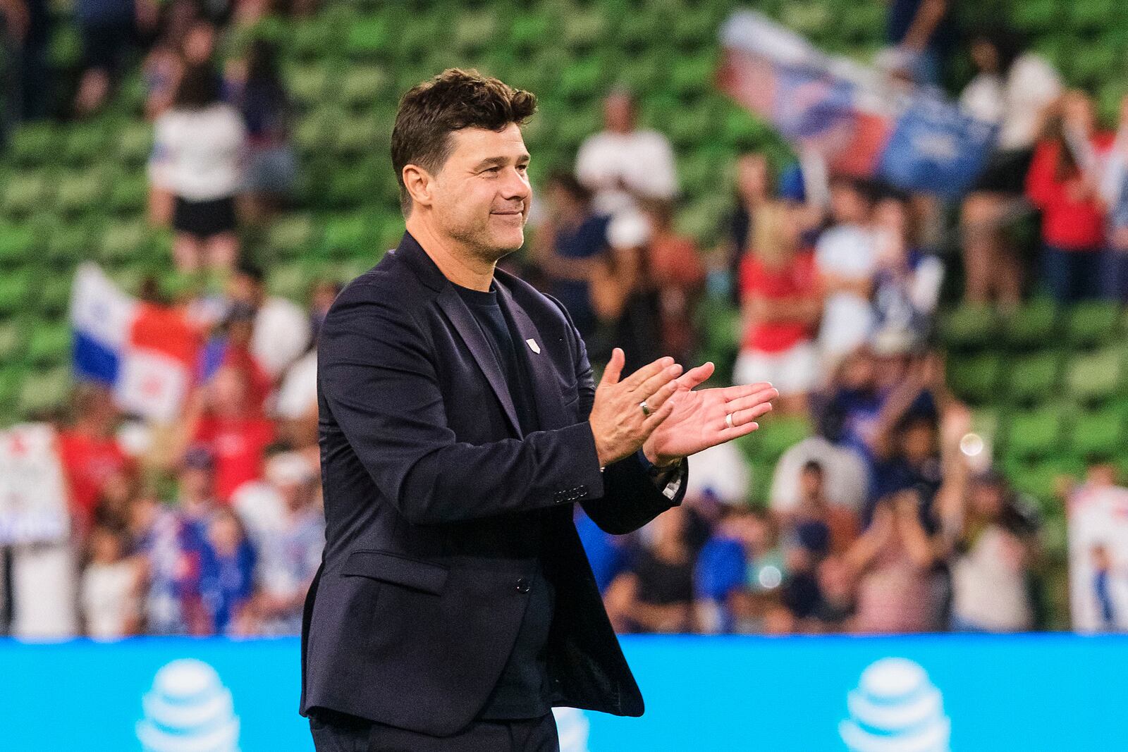 FILE - United States head coach Mauricio Pochettino celebrates with fans after defeating Panama in an international friendly soccer match, Saturday, Oct. 12, 2024, in Austin, Texas. (AP Photo/Rodolfo Gonzalez, File)