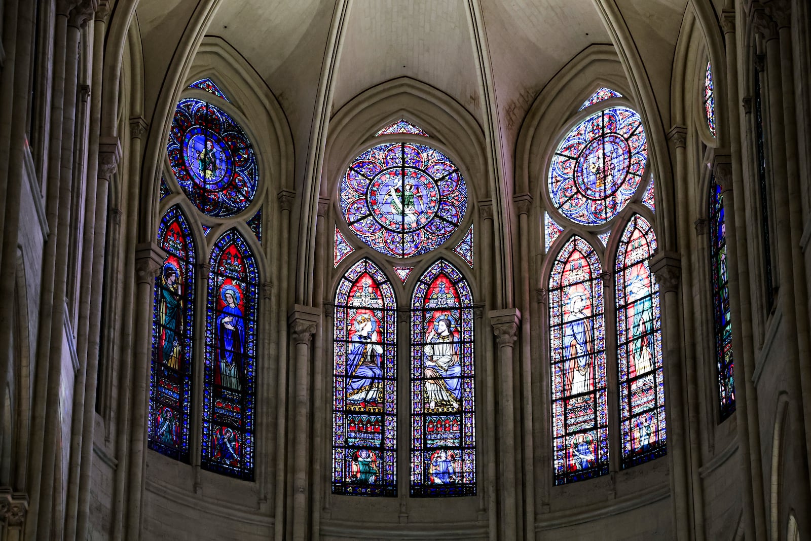 Windows in the heart of Notre-Dame de Paris cathedral are seen while French President Emmanuel Macron visits the restored interiors of the monument, Friday Nov. 29, 2024, in Paris. (Stephane de Sakutin, Pool via AP)