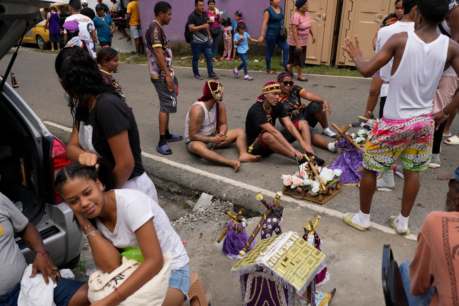 Pilgrims crawl to San Felipe Church to honor the Black Christ in Portobelo, Panama, Monday, Oct. 21, 2024, during a festival celebrating the iconic statue that was found on the shore in 1658. (AP Photo/Matias Delacroix)