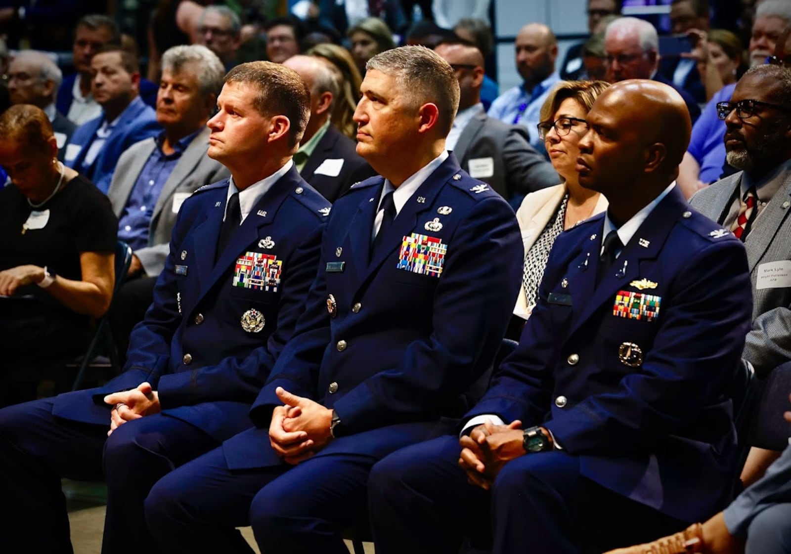 In the front row, three colonels who serve at Wright-Patterson Air Force Base. From the left, Col. Dustin Richards, commander of the 88th Air Base Wing; Col. Kenneth Stremmel, commander of the National Air and Space Intelligence Center, and Col. Marcus Starks, commander of the National Space Intelligence Center. MARSHALL GORBY/STAFF