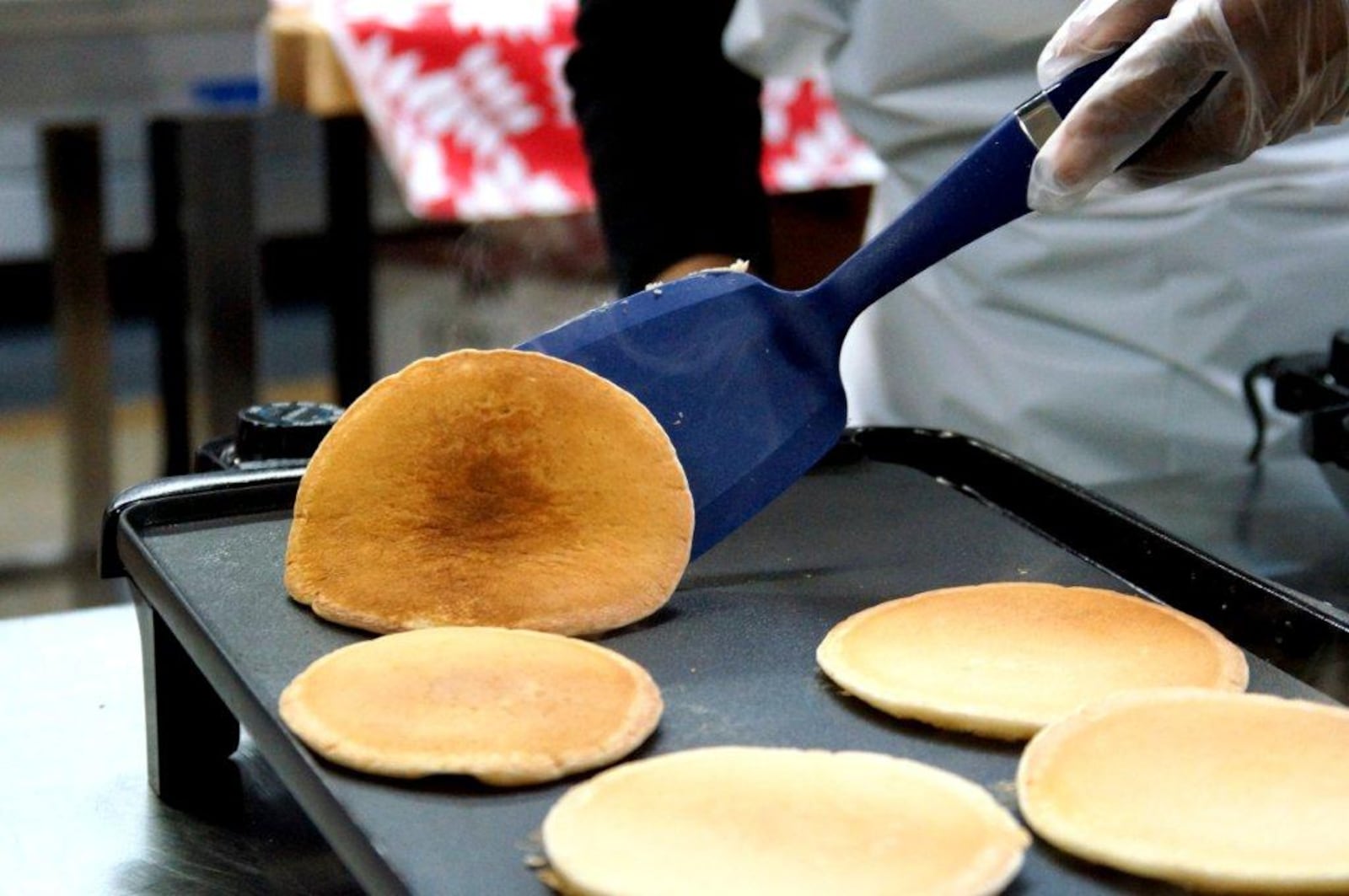 On Sunday, Feb. 25, an estimated 4,000 guests will chow down on pancakes and sausage for "Day of Caring" in an effort to help those less fortunate. FILE