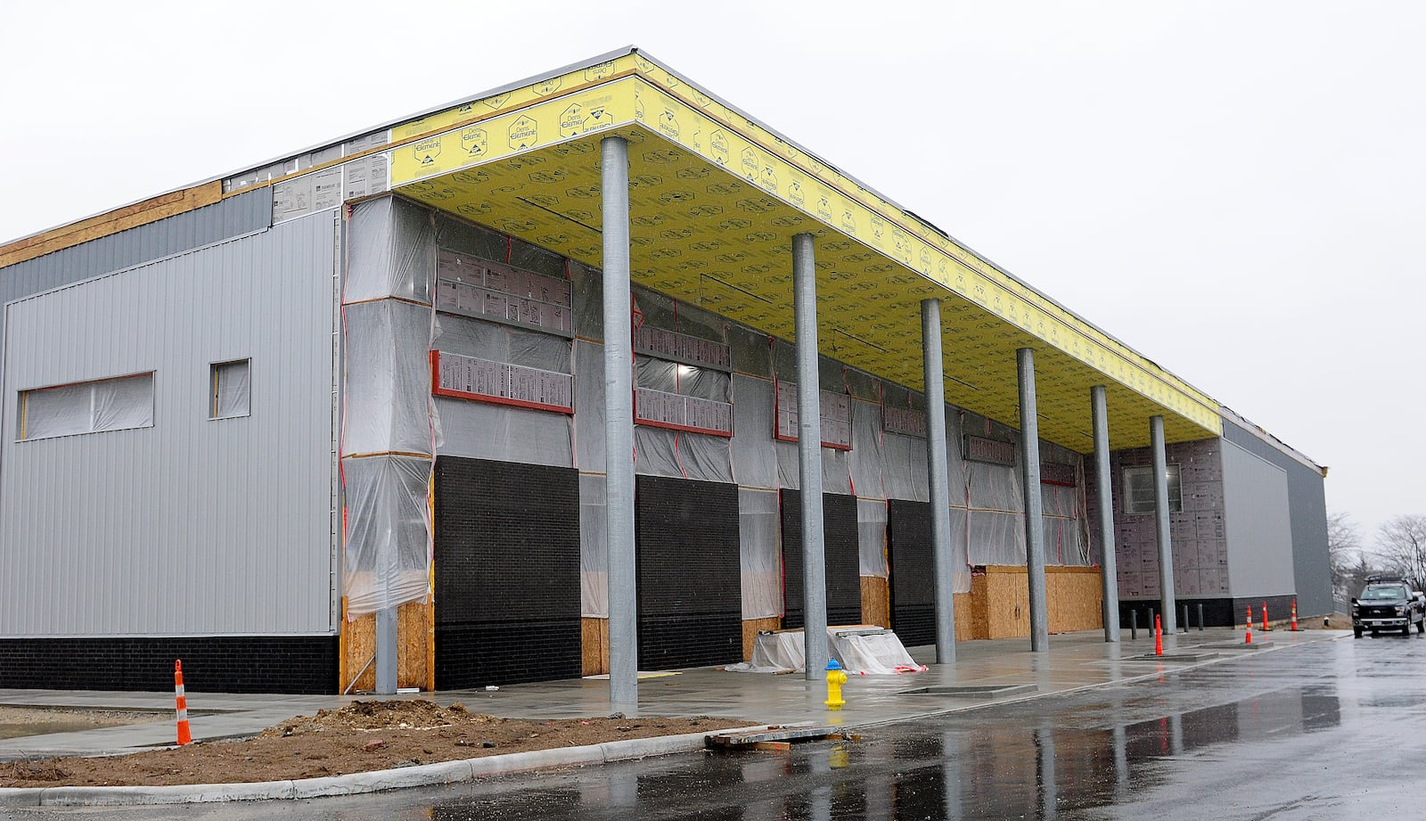 Work continues on the Homefull’s new West Dayton grocery store on South Gettysburg Ave. Tuesday, Jan 23, 2024 The 16-arce development will include a Kettering Health primary care practice for all ages and the Ziks Family Pharmacy with medicine and health-related items. MARSHALL GORBY\STAFF