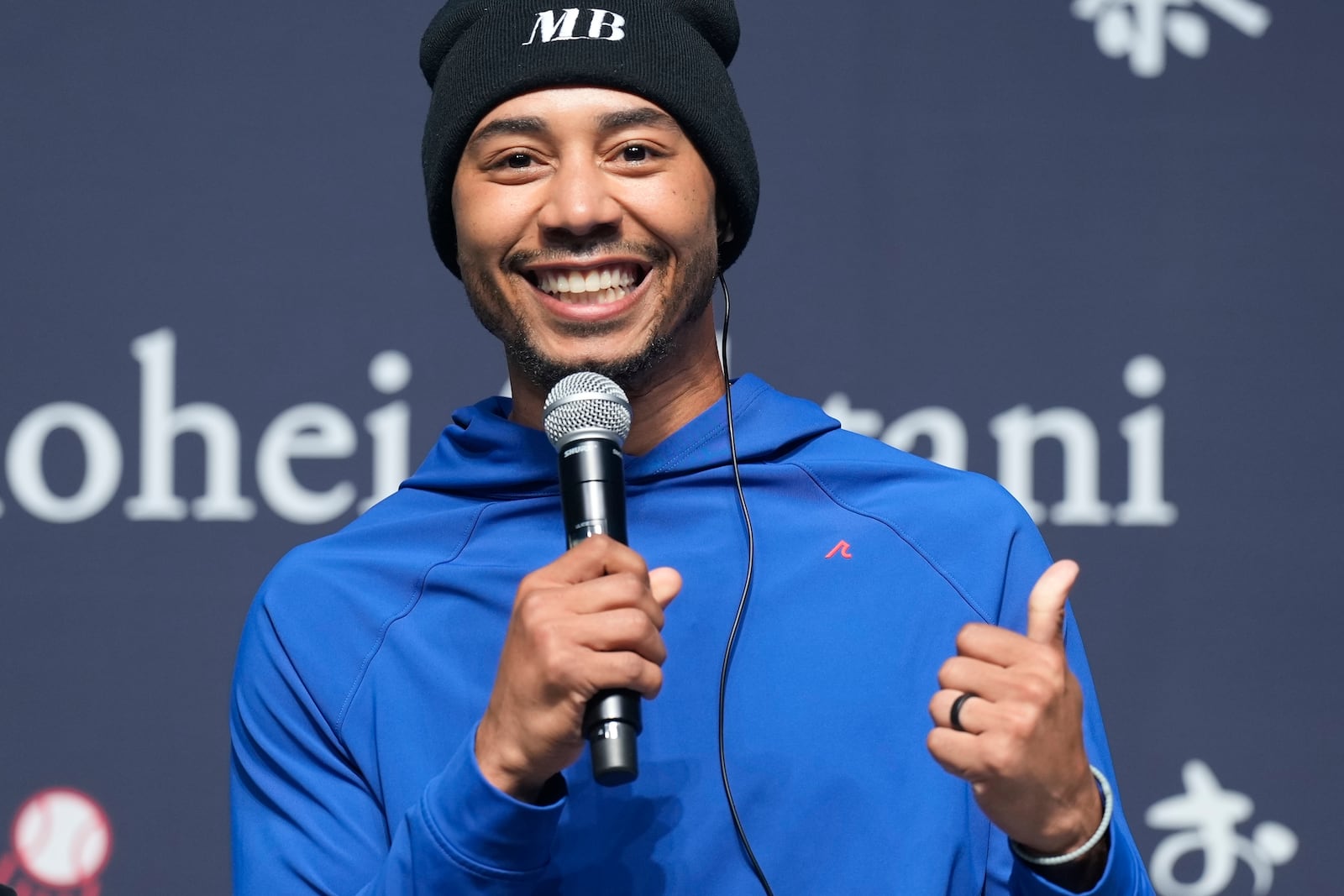 Los Angeles Dodgers right fielder Mookie Betts speaks during a sponsor's promotional event in Tokyo, Tuesday, Jan. 21, 2025. (AP Photo/Eugene Hoshiko)