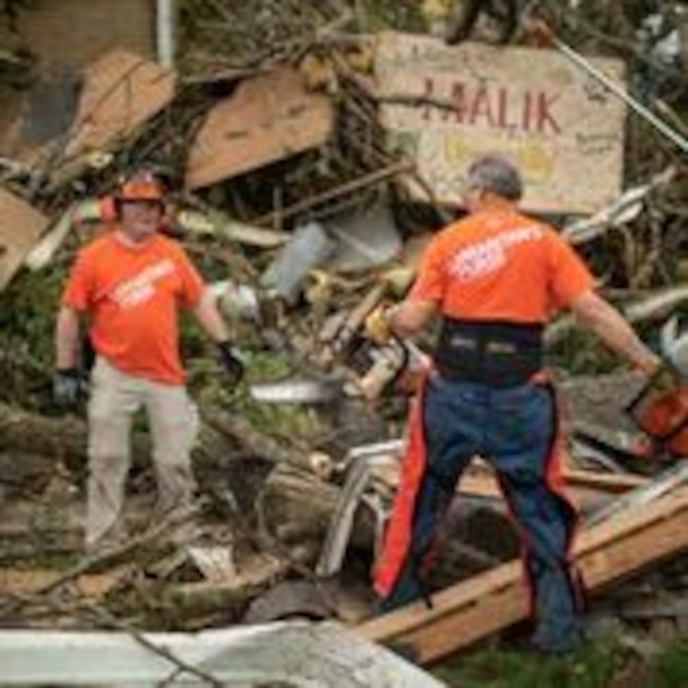 Volunteers help tornado-damaged communities