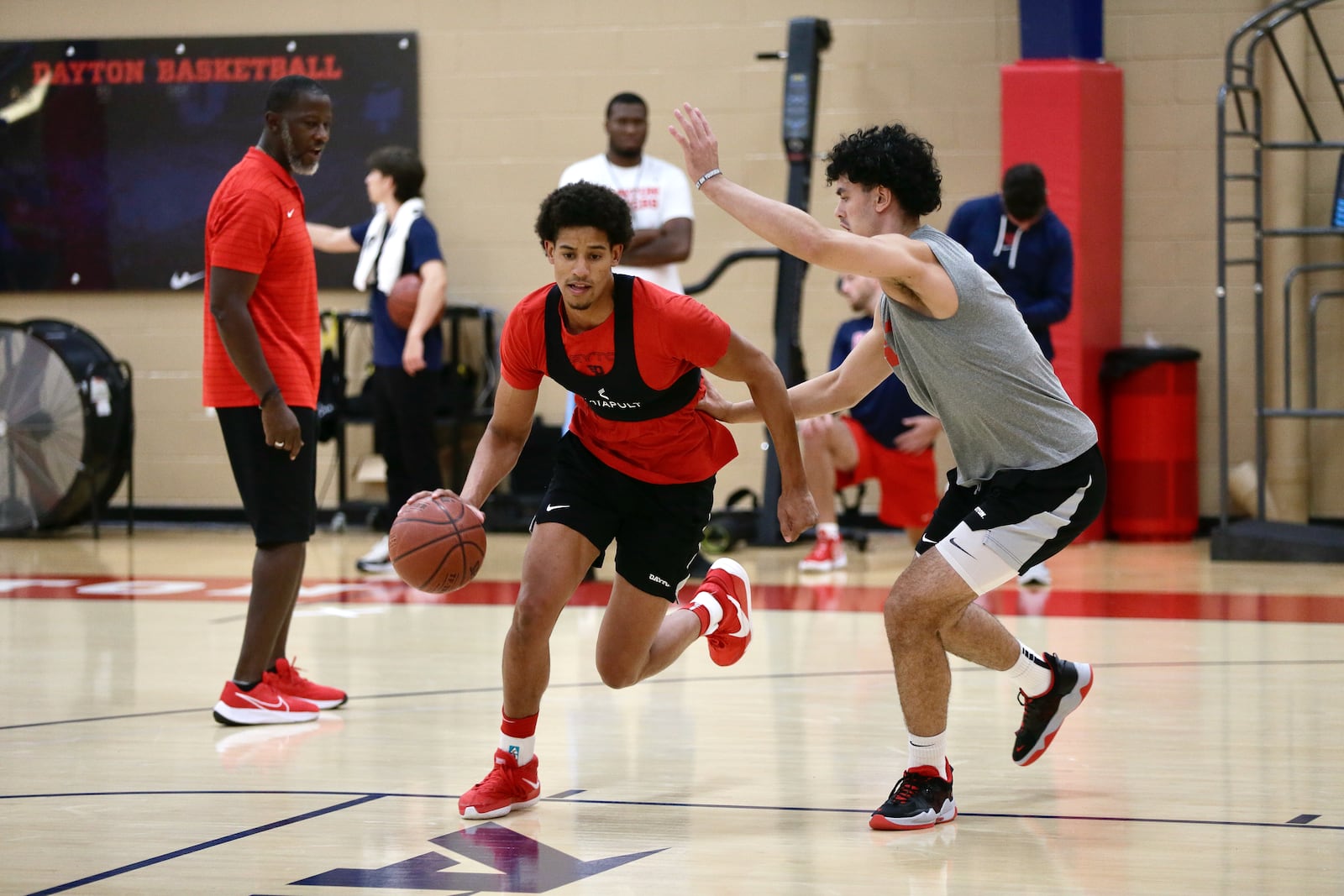 Dayton's Zimi Nwokeji dribbles against Mustapha Amzil during a summer practice at the Cronin Center on Monday, Aug. 1, 2022, in Dayton. David Jablonski/Staff