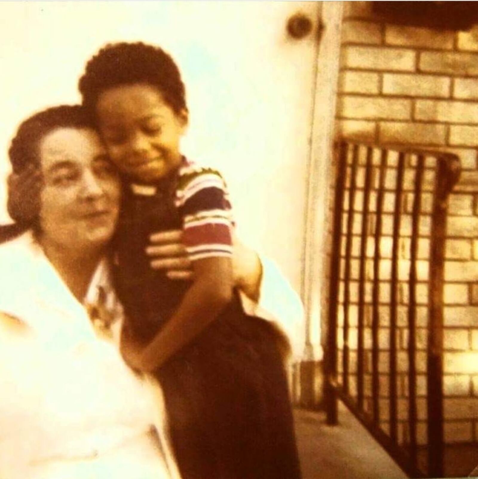 Sam Hemingway, then about 3, gets a hug from his mother, Joyce Camp. She died when he was 19 years old. CONTRIBUTED