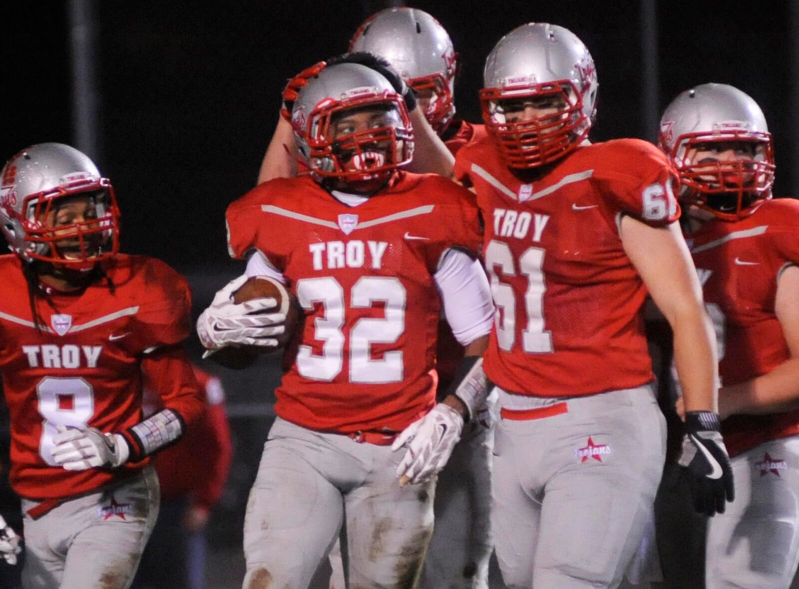 Troy’s Josh Browder (with ball) scored four first-half touchdowns. Troy hosted Cincinnati Anderson in a D-II, Region 8 first-round high school football playoff game at Memorial Stadium on Friday, Nov. 4, 2016. MARC PENDLETON / STAFF