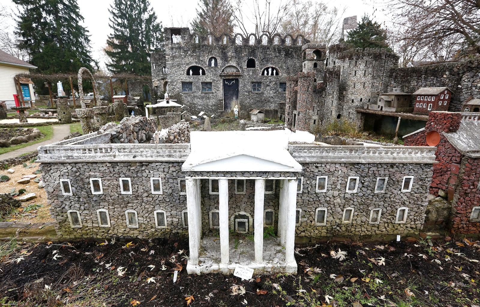 A replica of the White House in the Hartman Rock Garden is made of concrete and granite.  LISA POWELL / STAFF