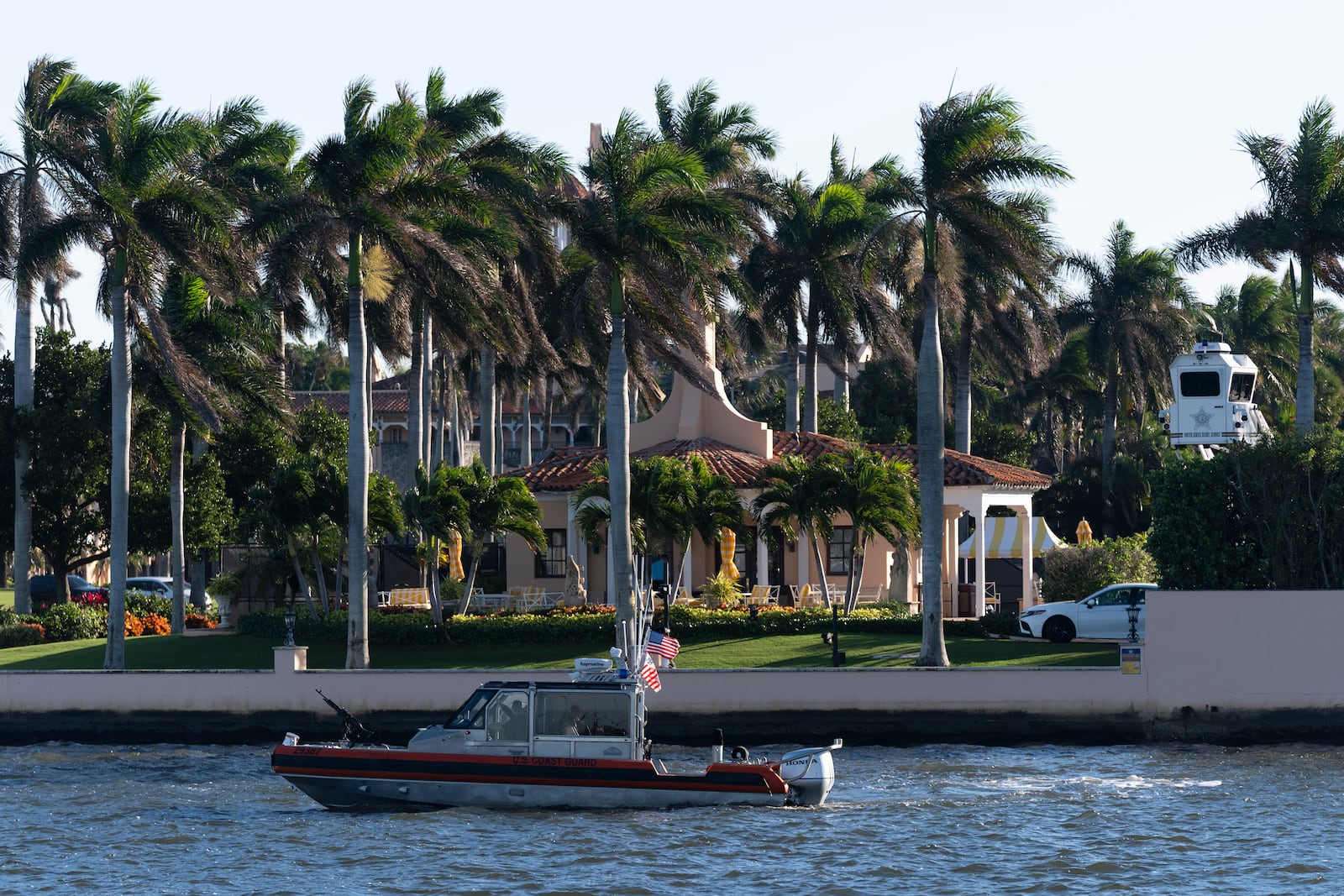 A Coast Guard patrol boat cruises near Mar-a-Lago, President-elect Donald Trump's Palm Beach home, in Palm Beach, Fla., Saturday, Dec. 21, 2024. (AP Photo/Manuel Balce Ceneta)