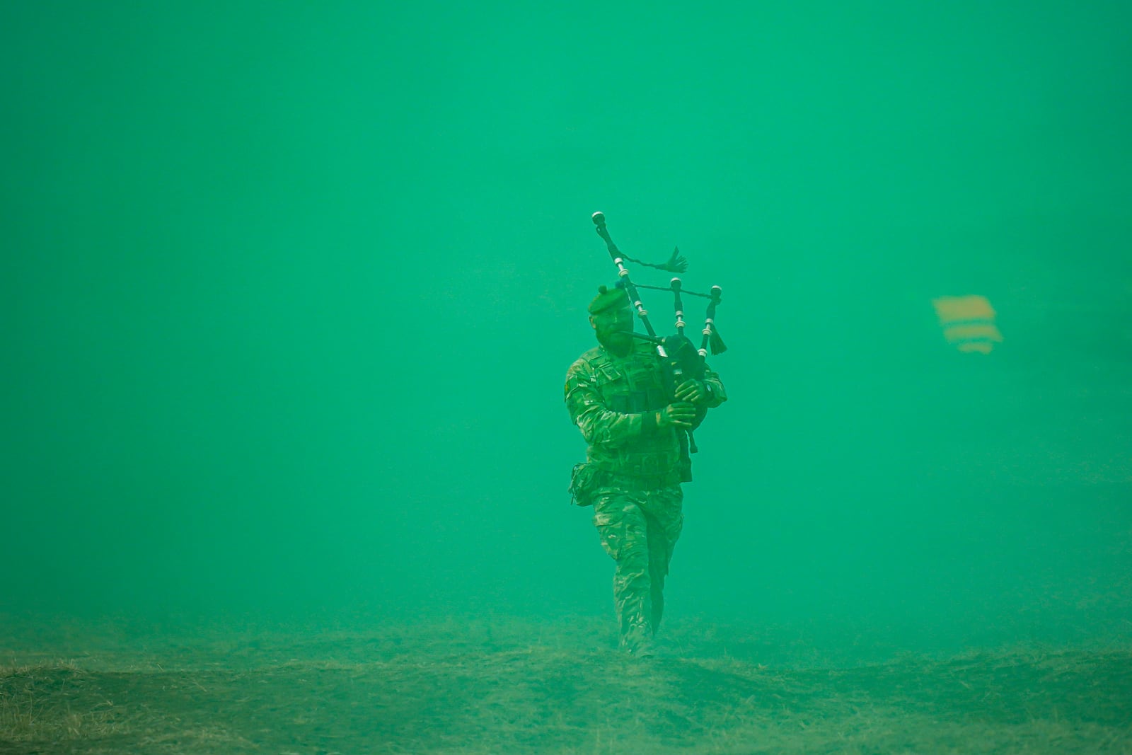 A Scottish piper attached to British troops plays the pipe at the end of the Steadfast Dart 2025 exercise, involving some 10,000 troops in three different countries from nine nations and represent the largest NATO operation planned this year, at a training range in Smardan, eastern Romania, Wednesday, Feb. 19, 2025. (AP Photo/Vadim Ghirda)