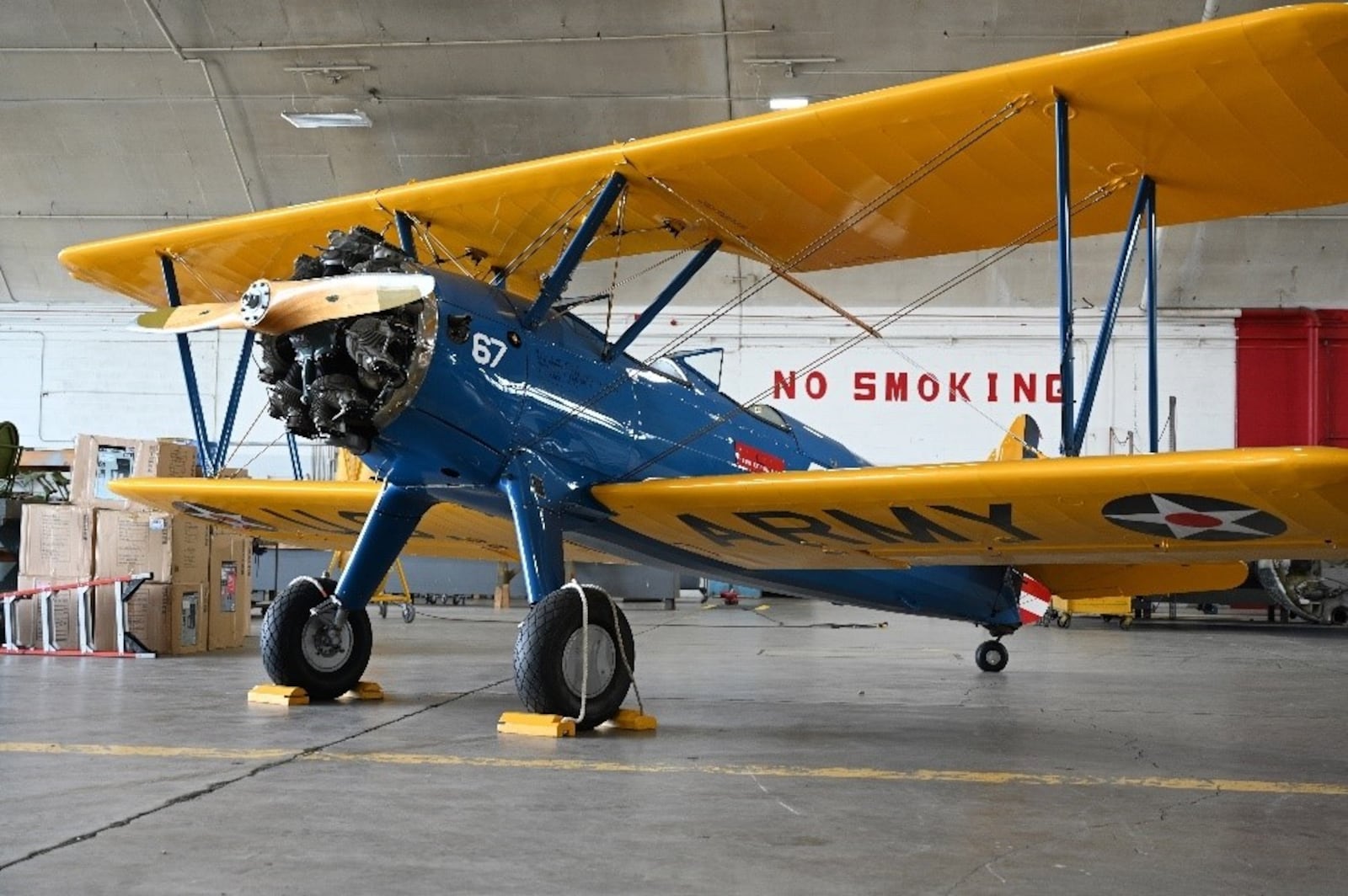 PT-17 Stearman (SN 41-25454) in the Restoration Hangar at the National Museum of the United States Air Force. (U.S. Air Force photo by Lisa M. Riley)