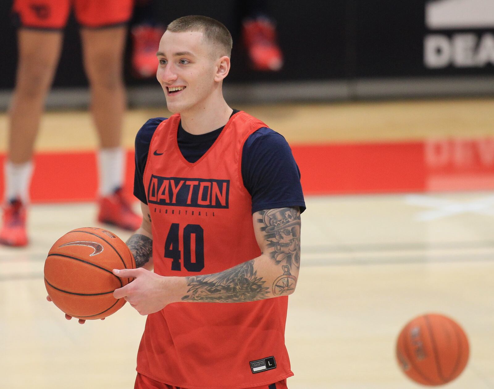 Dayton's Chase Johnson smiles during practice at UD Arena on Thursday, Nov. 5, 2020. David Jablonski/Staff