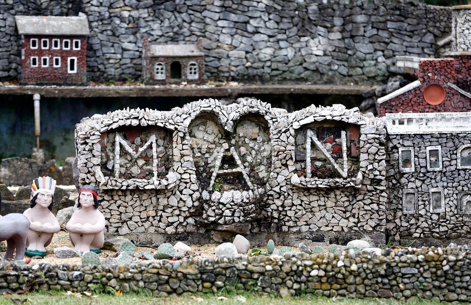 Harry George "Ben" Hartman encircled the word 'MAN" with a heart using concrete, granite and mirrored glass to make a personal emblem.  LISA POWELL / STAFF