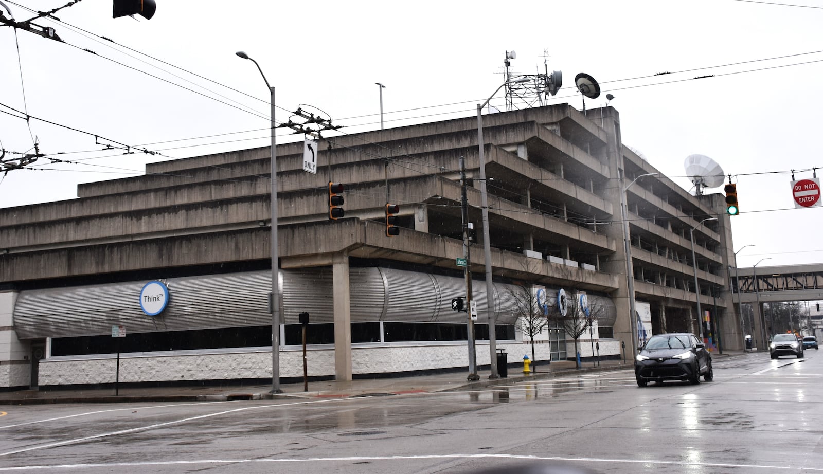 The Oregon District parking garage in downtown Dayton by the Dayton Convention Center is massive, with 1,376 spaces. But on Tuesday afternoon, only about 63 spaces were filled. CORNELIUS FROLIK / STAFF