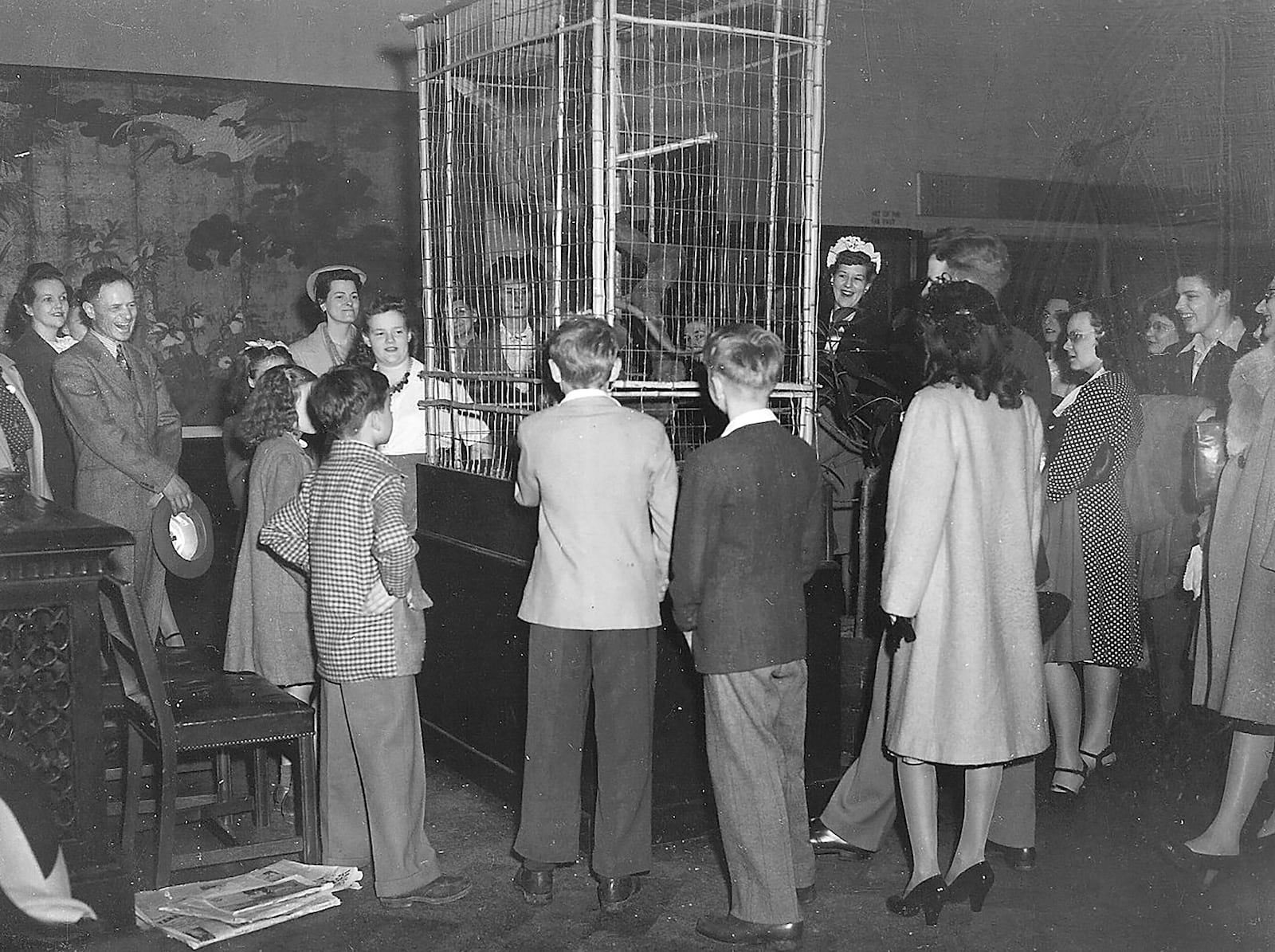 A crowd gathers around a cage to see Skipper the monkey at the Dayton Art Institute. Siegfried R. Weng, who at age 25 became the museumâs first director, created a zoo to attract visitors during the 1930s and 1940s. DAYTON ART INSTITUTE