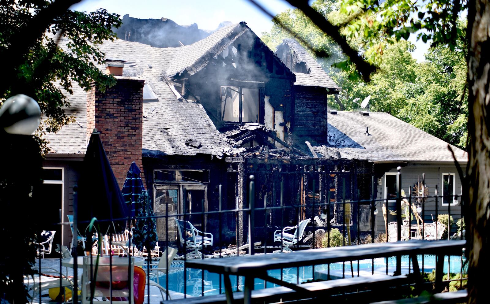 Crews responded to a house fire in the 5900 block of Old Forest Lane on Friday, Aug. 9, 2019. NICK GRAHAM / STAFF