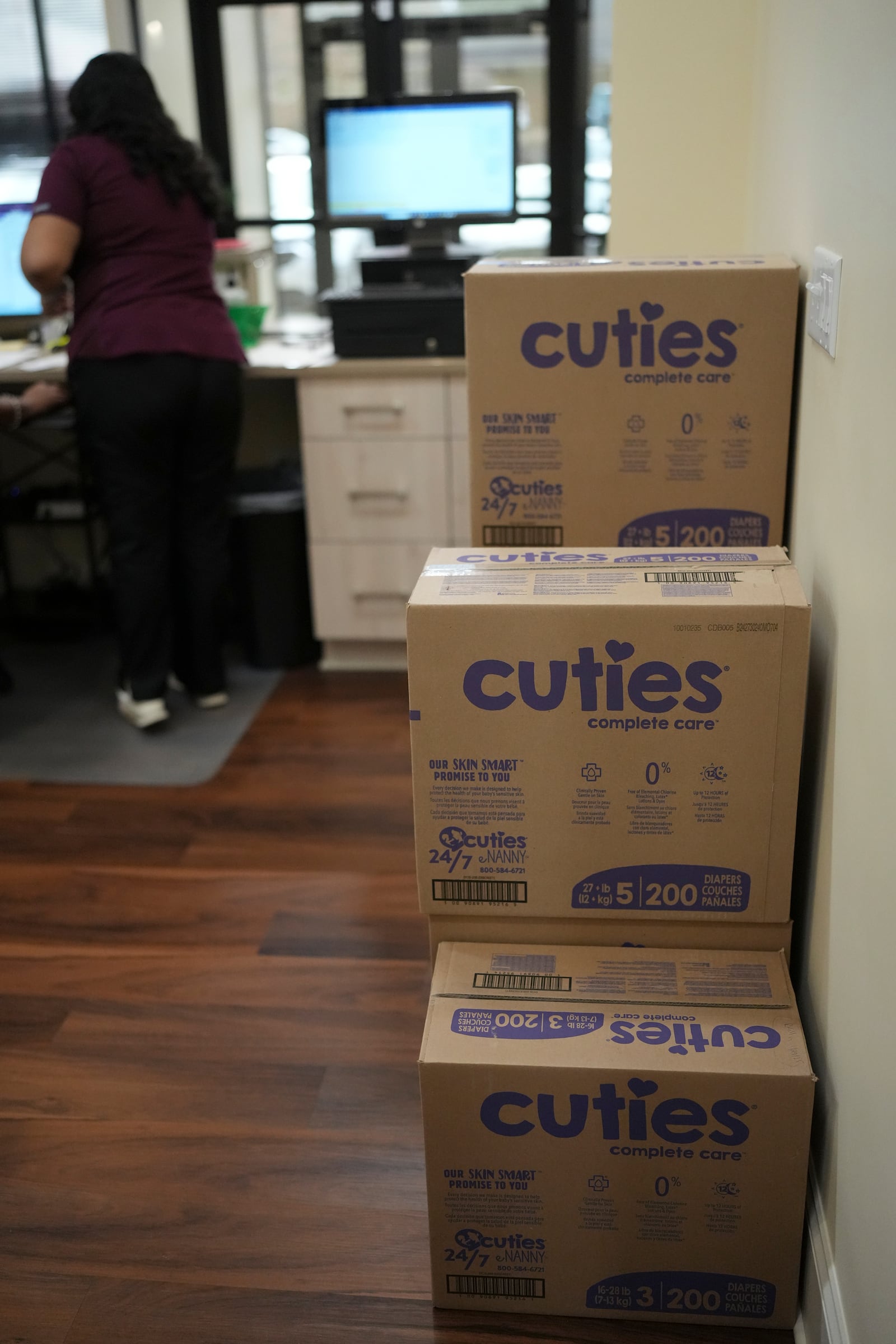 Boxes of diapers are stacked at the Pharmalife Community Pharmacy, Monday, Dec. 9, 2024, in Murfreesboro, Tenn. The business provides diapers free of charge to customers who qualify through the state's TennCare Diaper Benefit. (AP Photo/George Walker IV)