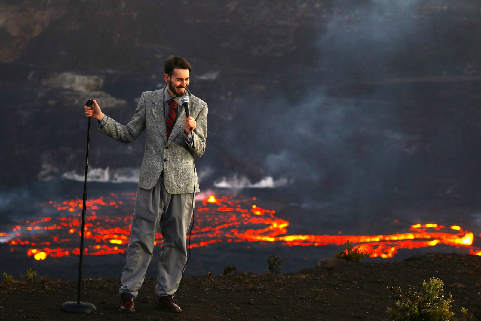 Comedian Ben Miller performing an impromptu improv set near the lava flow of a volcano in Hawaii. CONTRIBUTED