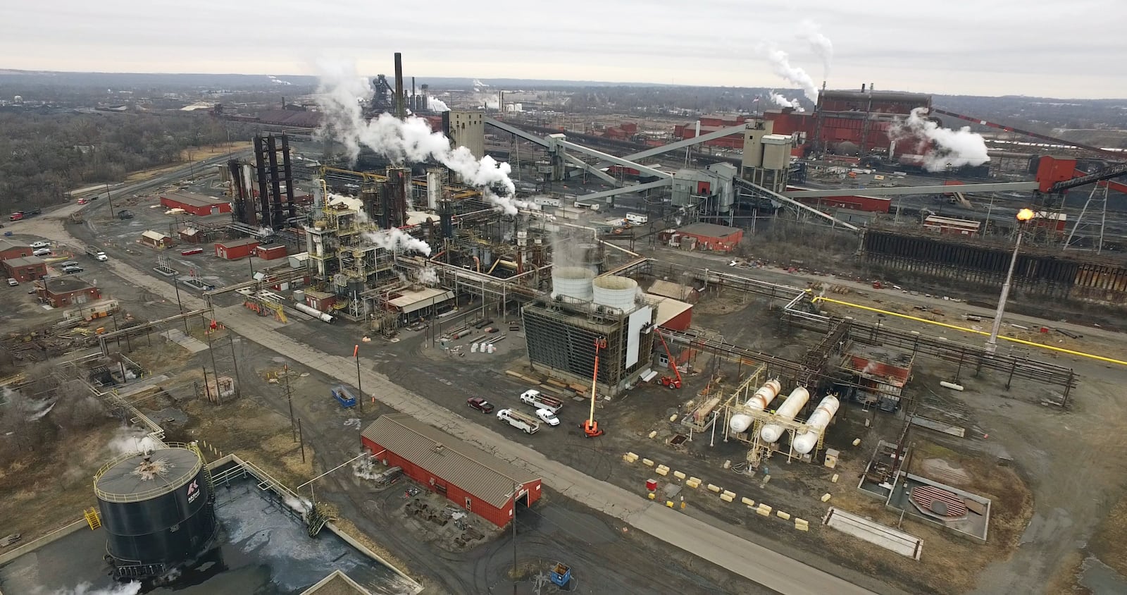 Aerial view of the AK Steel Middletown Works.  The big steel producer covers more than 2,700 acres in the city to operate coke ovens, a blast furnace, hot strip mill and more than a dozen other steel production related processes.   TY GREENLEES / STAFF