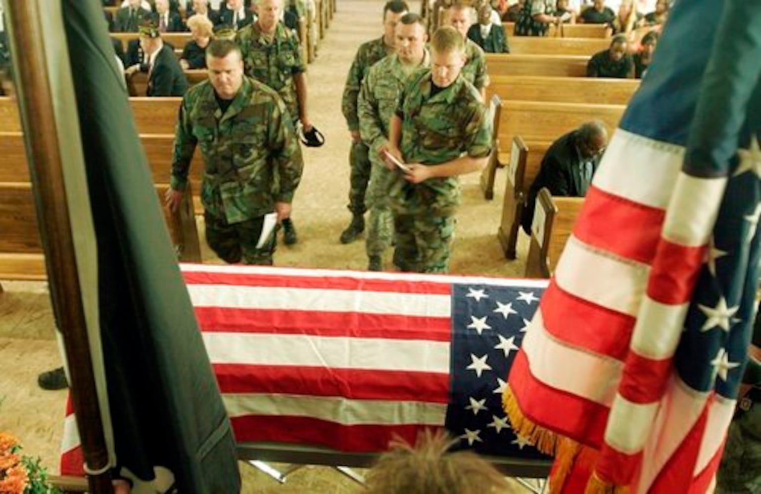 Funeral for slain 3 war veteran