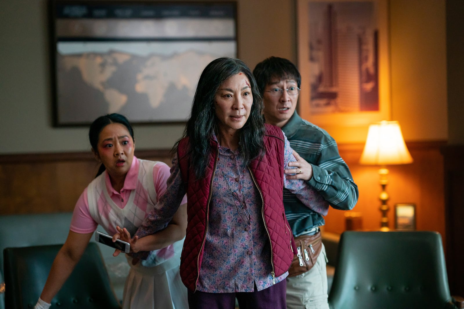 This image released by A24 Films shows, from left, Stephanie Hsu, Michelle Yeoh and Ke Huy Quan in a scene from, "Everything Everywhere All At Once." (Allyson Riggs/A24 Films via AP)