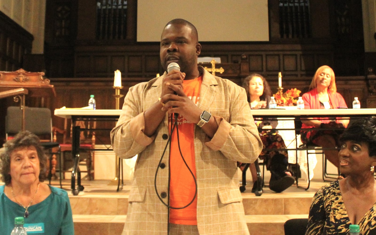 Dayton City Commission candidate Marcus Bedinger speaks at a candidate forum held in September hosted by the Dayton Unit NAACP. CORNELIUS FROLIK / STAFF