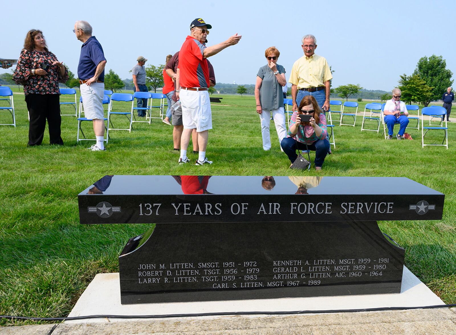 Attendees check out the new memorial bench honoring one family of brothers following a dedication ceremony July 20 at the National Museum of the U.S. Air Force. U.S. AIR FORCE PHOTO/R.J. ORIEZ