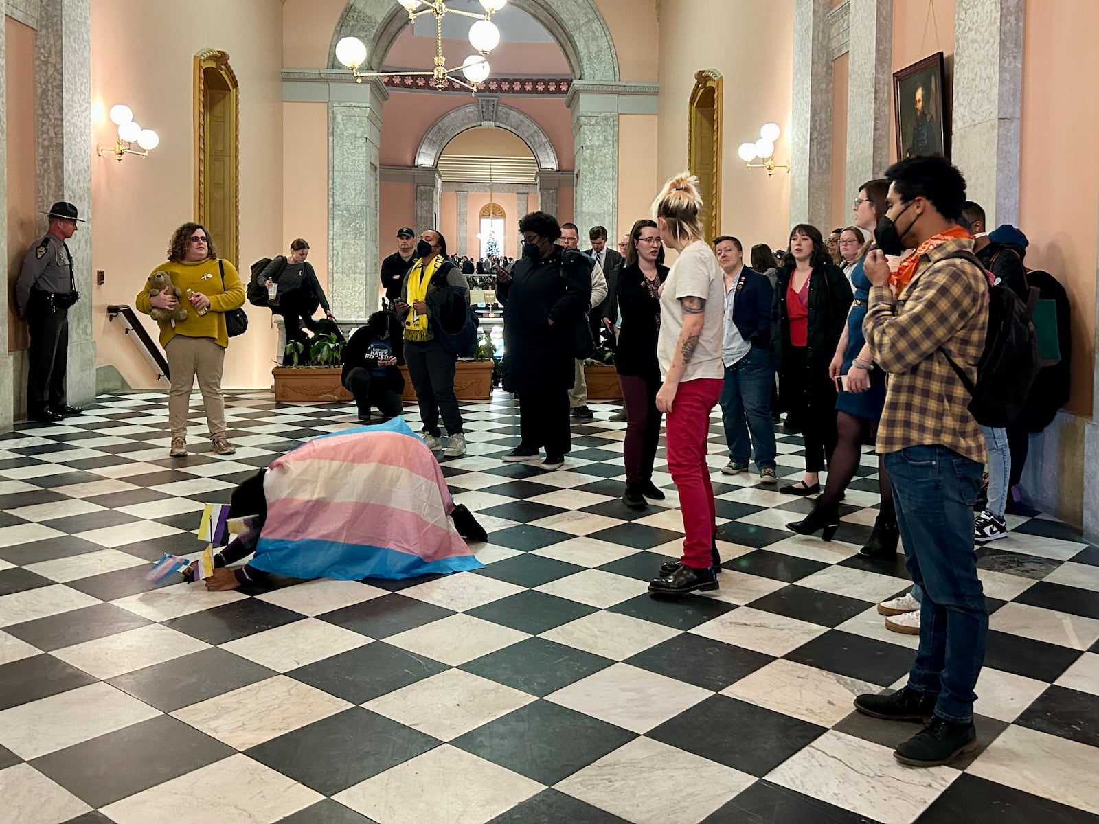 A group of protesters chants the word "shame" after the Ohio Senate passes an amended version of House Bill 68, banning minors from undergoing gender affirming medical treatments. Dec. 13, 2023.