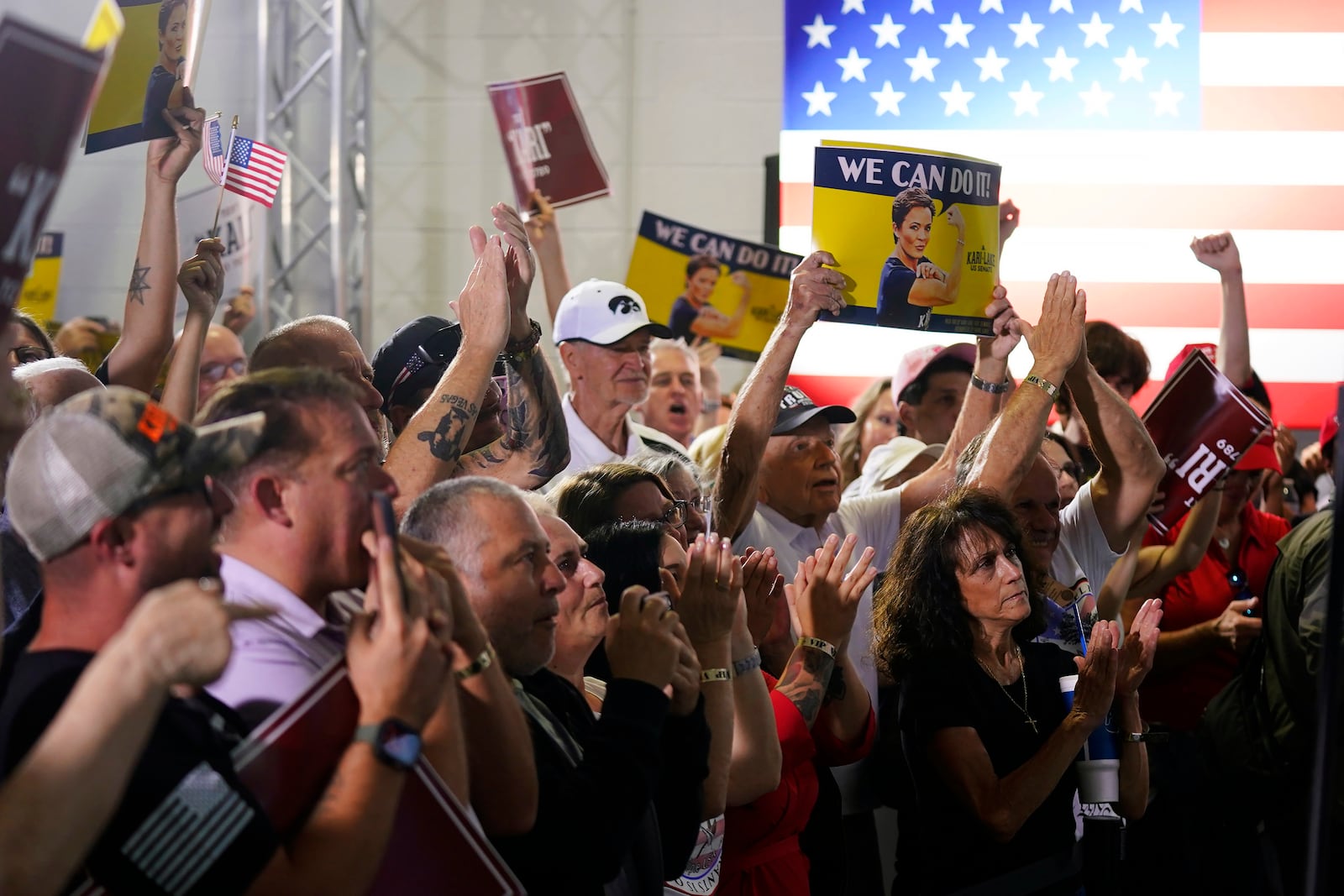 FILE - Supporters cheer as Republican candidate Kari Lake announces her plans to run for the Arizona U.S. Senate seat during a rally, Oct. 10, 2023, in Scottsdale, Ariz. (AP Photo/Ross D. Franklin, File)