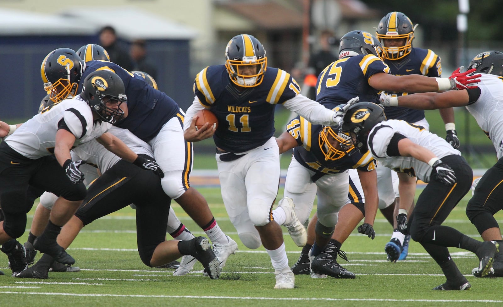 Springfield’s Leonard Taylor runs against Centerville in the first half on Friday, Sept. 15, 2017, at Evans Stadium in Springfield. David Jablonski/Staff