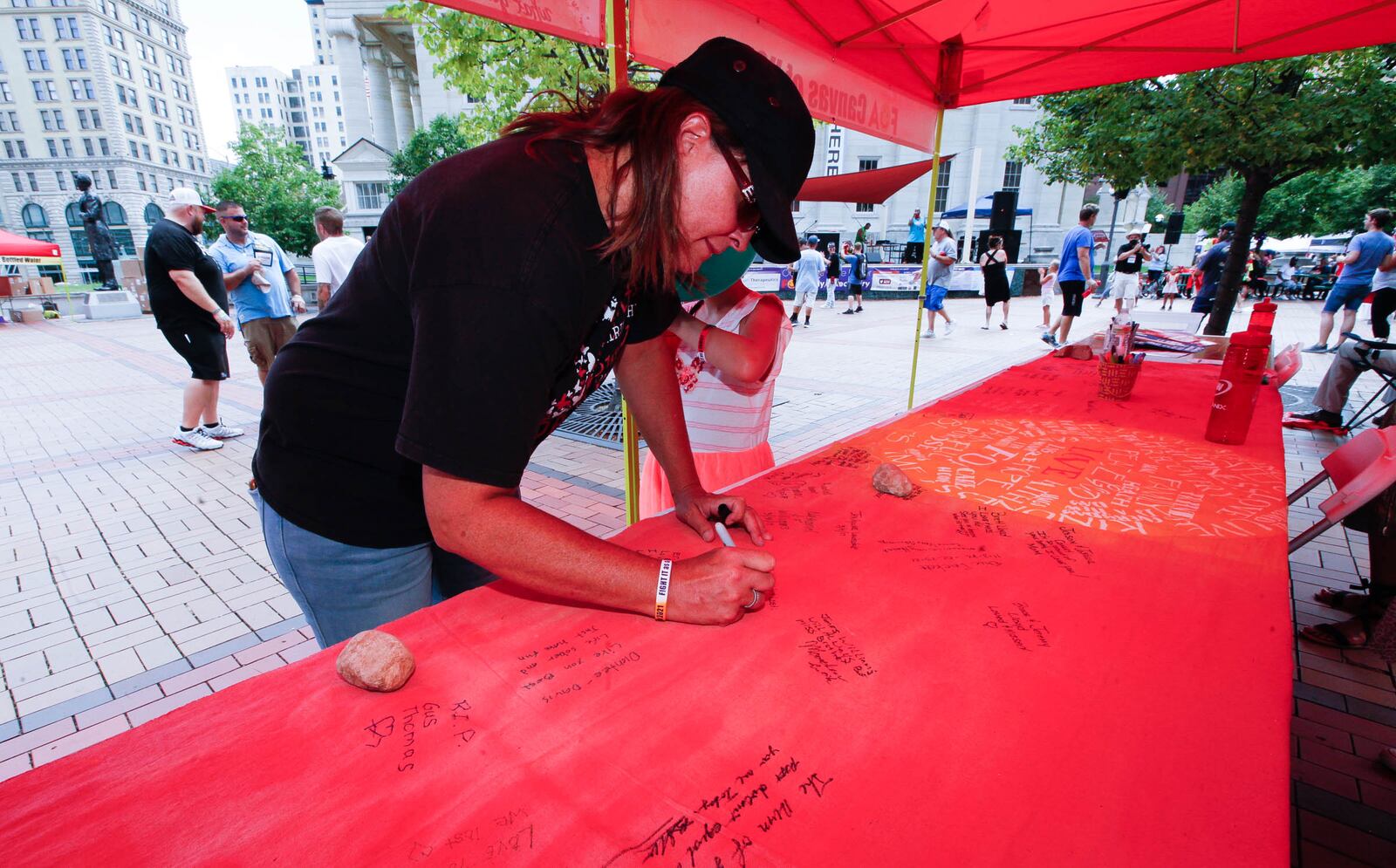 Tracy Pederson of Waverly attended Sunday's FOA Rally 4 Recovery and signed a banner in part: “To the suffering addict: As long as there is breath in your lungs there is hope! CHRIS STEWART / STAFF