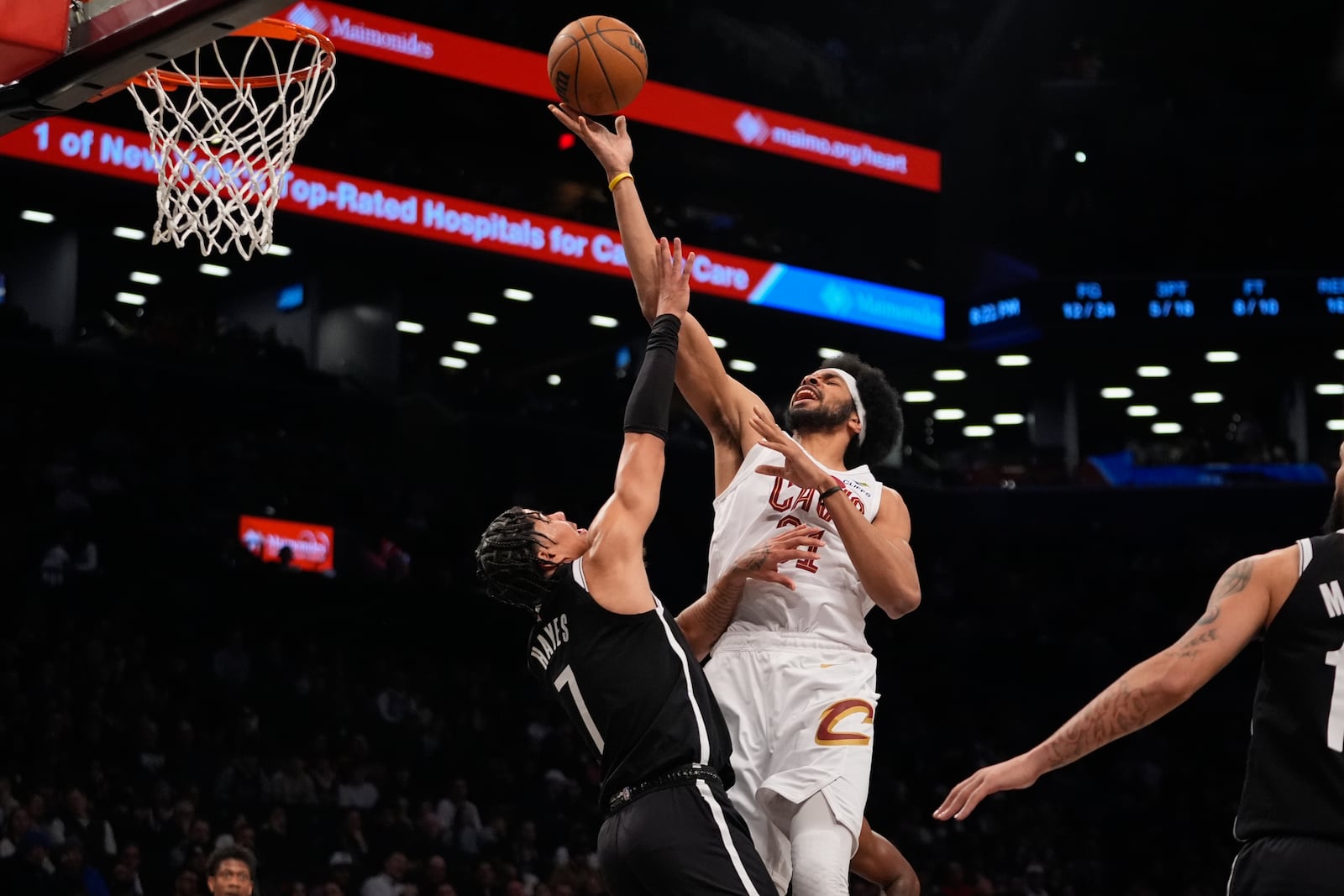 Cleveland Cavaliers' Jarrett Allen (31) shoots over Brooklyn Nets' Killian Hayes (7) during the first half of an NBA basketball game Thursday, Feb. 20, 2025, in New York. (AP Photo/Frank Franklin II)