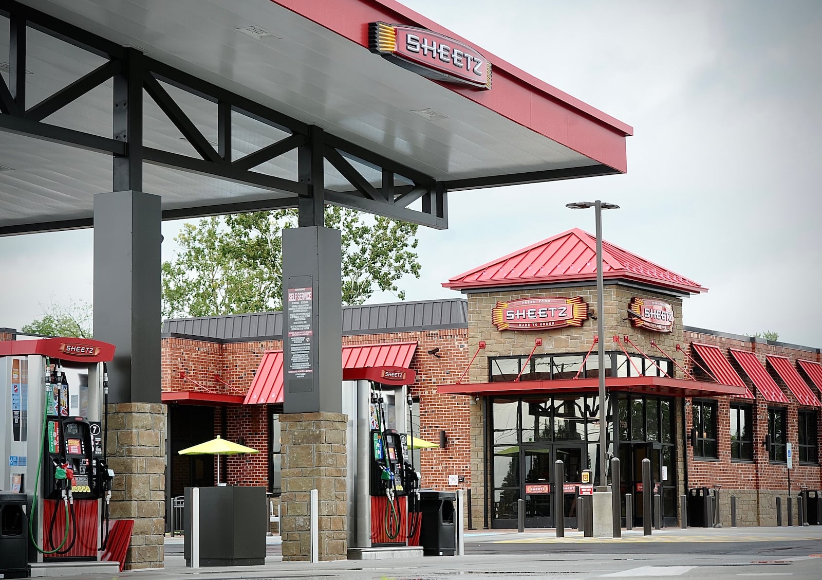 The new Sheetz gas station located at the corner of Old Troy Pike and Taylorsville Road in Huber Heights is one of many Sheetz stores that will open in the Dayton area in the next few years. MARSHALL GORBY \STAFF