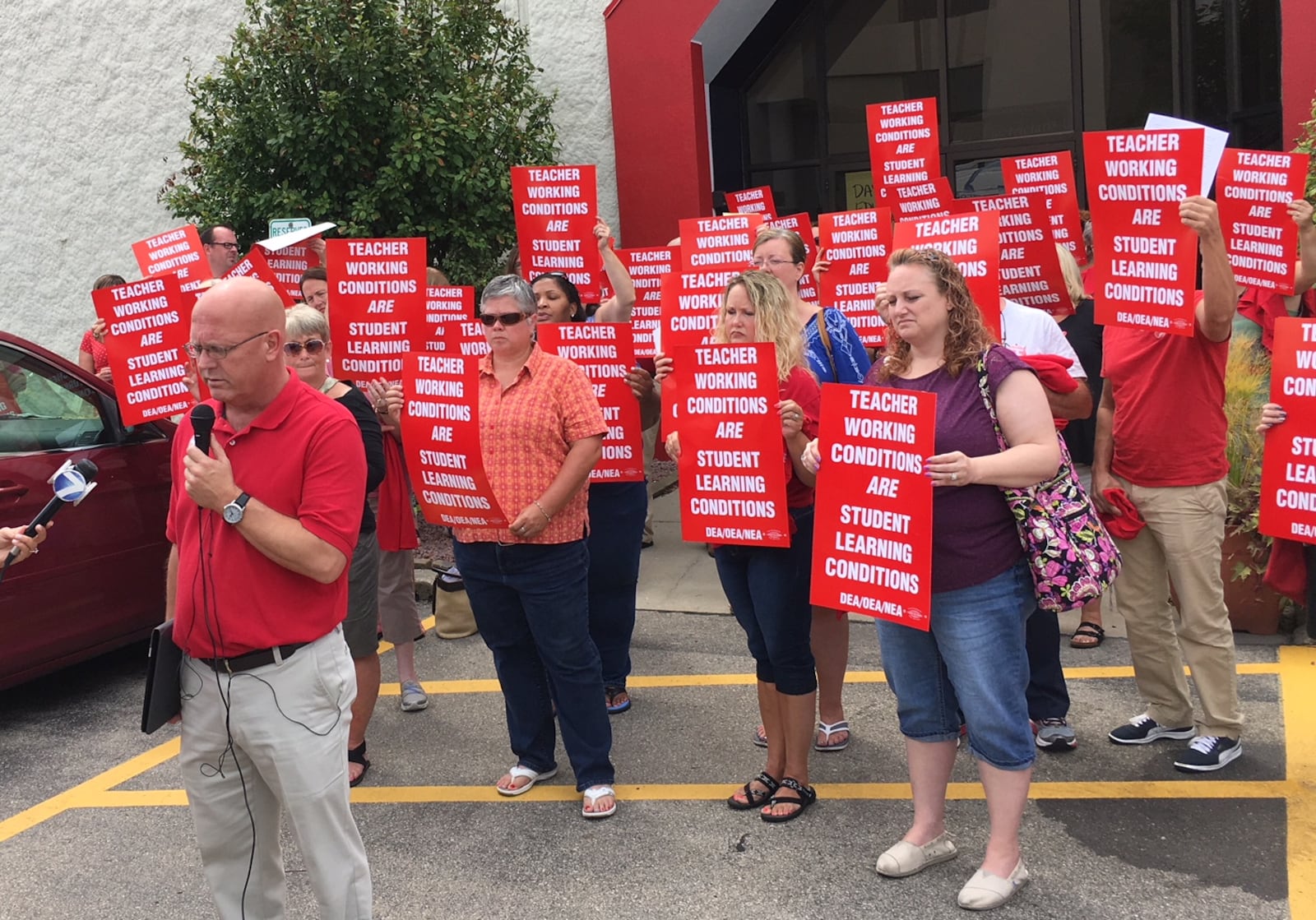 Teachers in Dayton Public Schools pushed for better contract conditions in 2017. The district’s starting salary is higher than many local districts, but veteran DPS teachers make thousands of dollars less than surrounding schools. JEREMY P. KELLEY / STAFF